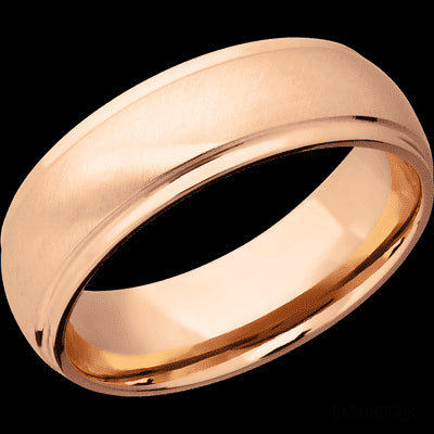 7 mm wide Domed Stepped Down Edges 14K Rose Gold band.