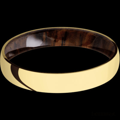 4 mm wide Domed 14K Yellow Gold band featuring a Cocobolo sleeve.