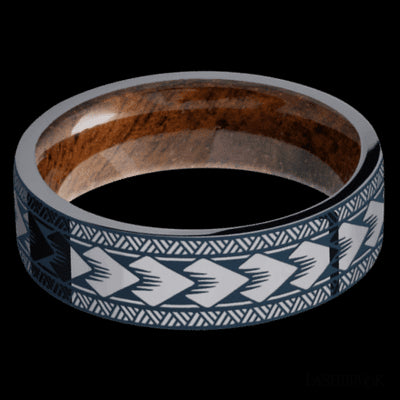 7 mm wide/Flat/Tantalum band with a laser carved Maori pattern also featuring a Koa sleeve.